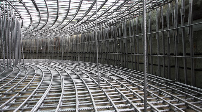 Why are Steel Rods utilized in Concrete Reinforcement?
